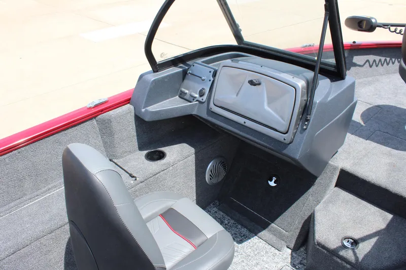 Slide: The Image of 2026 Tracker Super Guide V-16 SC boat interior with dual seats and steering console. - 8