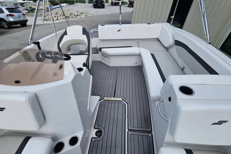 Slide: The Image of 2023 Starcraft SVX 171 OB boat interior with sleek seating and modern design. - 4