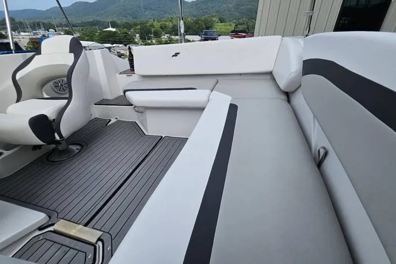 Slide: The Image of 2023 Starcraft SVX 171 OB boat interior with sleek seating and modern design. - 6