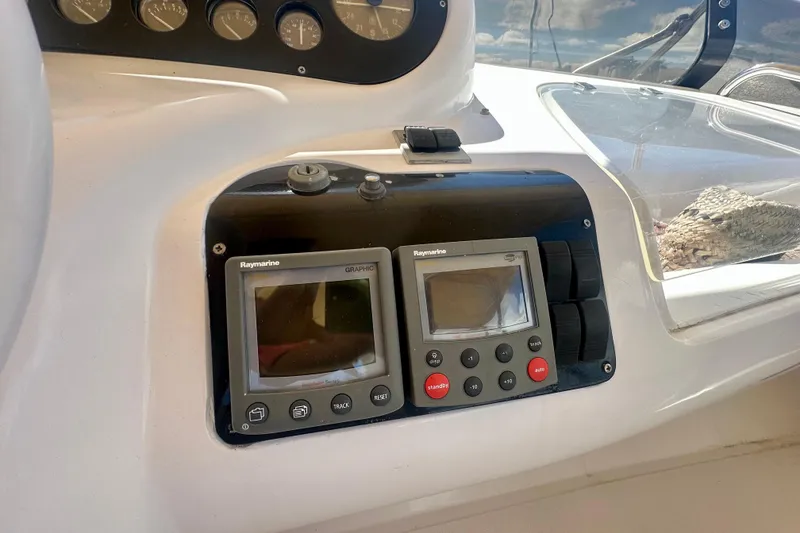 Slide: The Image of Control panel of a 1999 Azimut 58 yacht with Raymarine displays. - 40