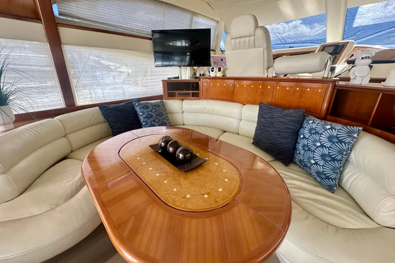Slide: The Image of Luxurious interior of a 1999 Azimut 58 yacht with elegant seating and decor. - 54