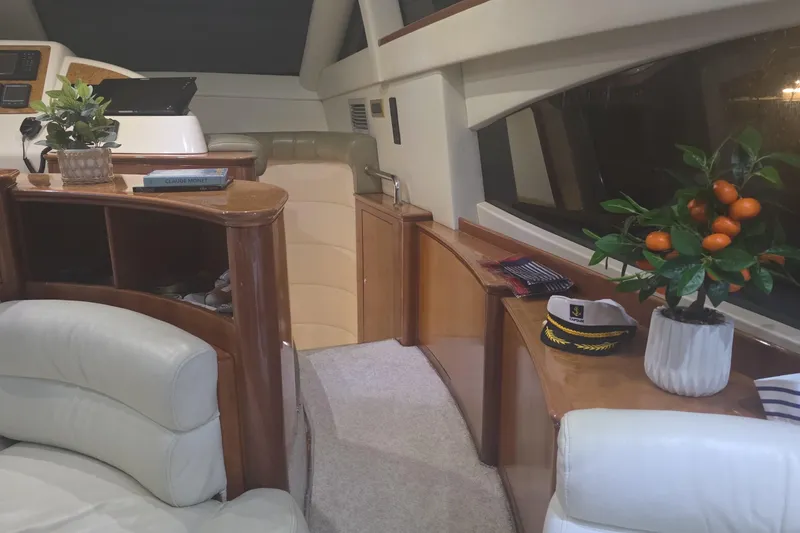 Slide: The Image of Luxurious interior of a 1999 Azimut 58 yacht with elegant furnishings and decor. - 86