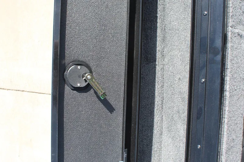 Slide: The Image of Lock mechanism on 2026 Tracker Targa V-18 Combo boat deck. - 22