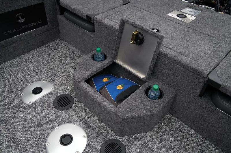 Slide: The Image of Manufacturer Provided Image: 2026 Tracker Targa V-18 Combo boat interior with storage compartment and cup holders. - 47