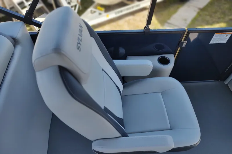 Slide: The Image of Luxurious seating in 2026 Sylvan Mirage X3 boat with cup holder and armrest. - 15