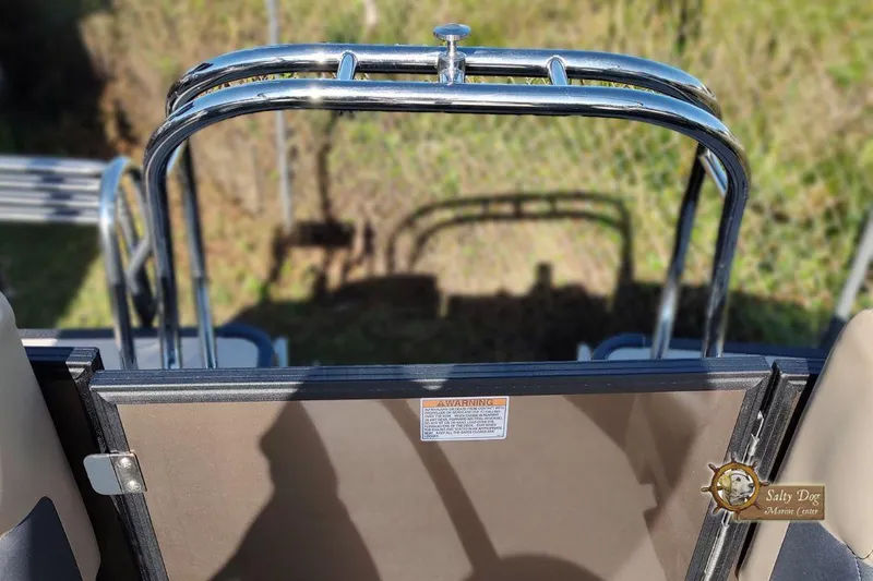 Slide: The Image of 2026 Sylvan Mirage X3 interior with "X Series" logo and cup holders. - 6