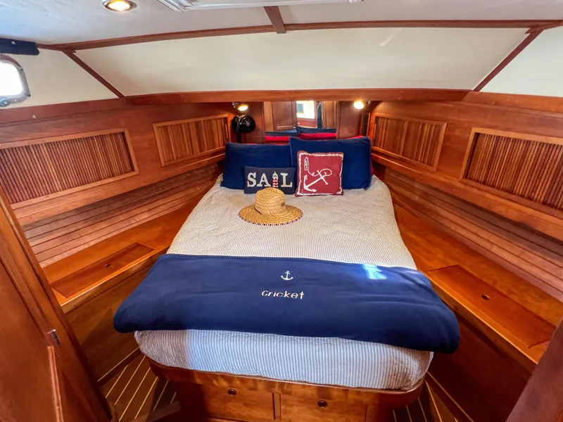Slide: The Image of Cozy cabin interior of 2001 Sabre 36 Express with nautical decor and wooden finishes. - 39