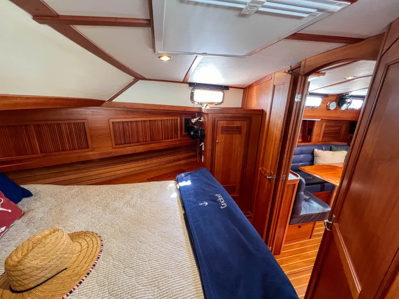 Slide: The Image of Interior of 2001 Sabre 36 Express yacht with cozy cabin and wooden furnishings. - 40
