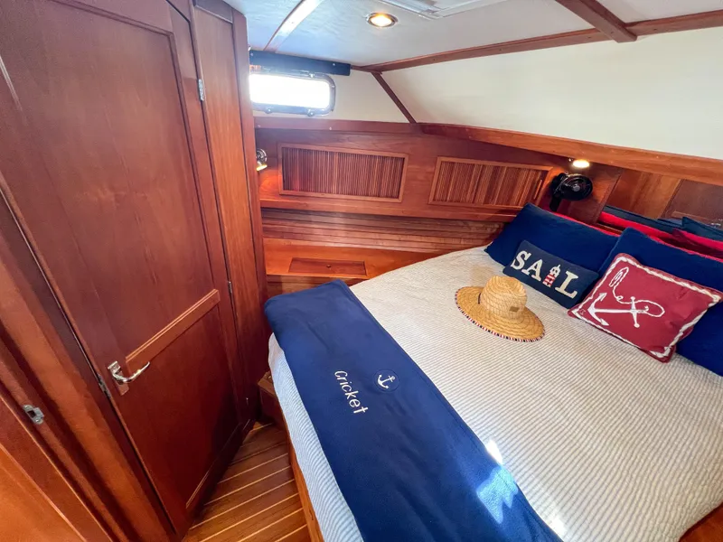 Slide: The Image of Cozy cabin interior of 2001 Sabre 36 Express with nautical decor and wooden finishes. - 41