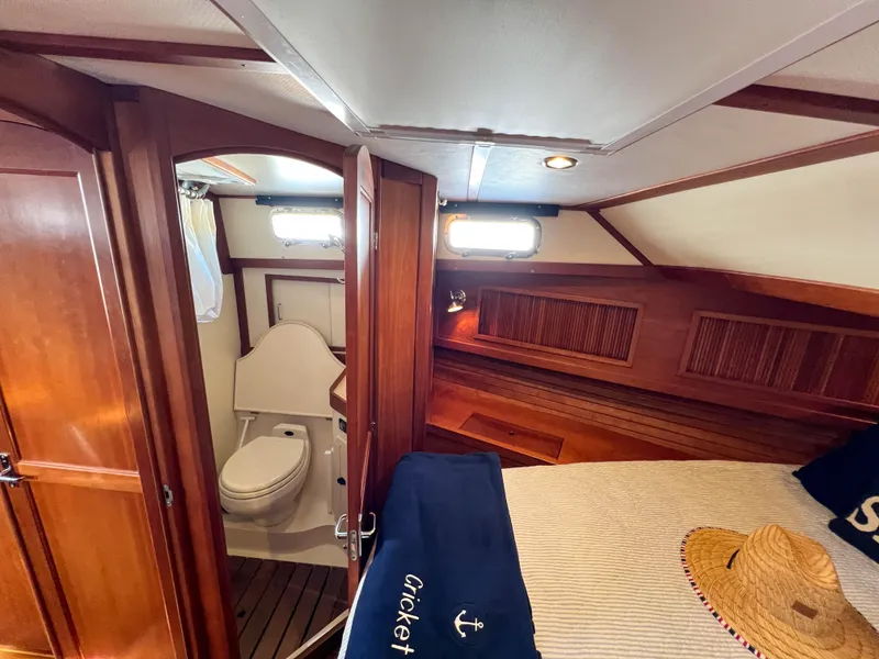 Slide: The Image of 2001 Sabre 36 Express cabin interior with bed and bathroom. - 42
