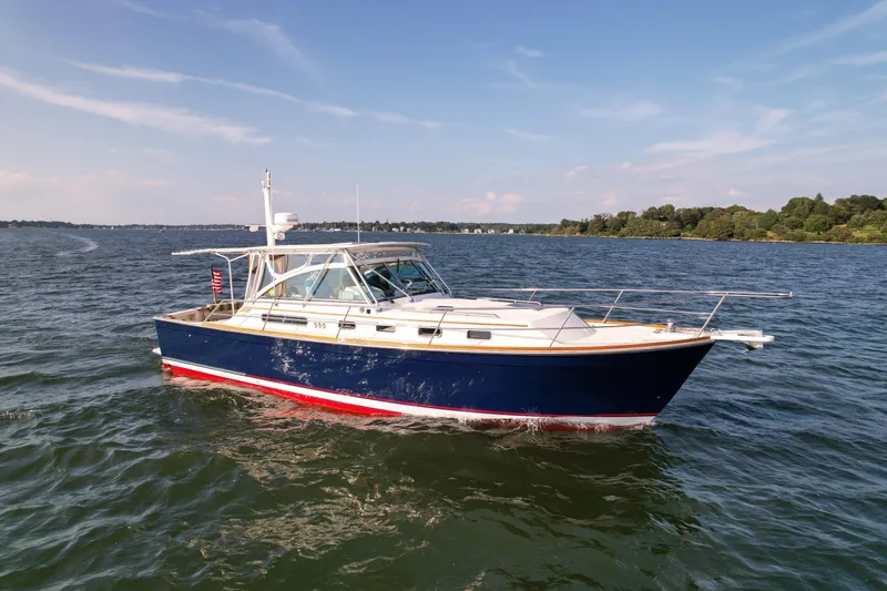 Slide: The Image of 2001 Sabre 36 Express boat cruising on a sunny day. - 5