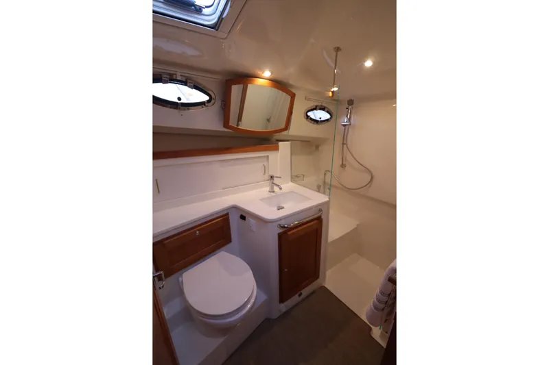 Slide: The Image of Luxurious bathroom in 2026 Back Cove 412 yacht with modern fixtures and wood accents. - 17