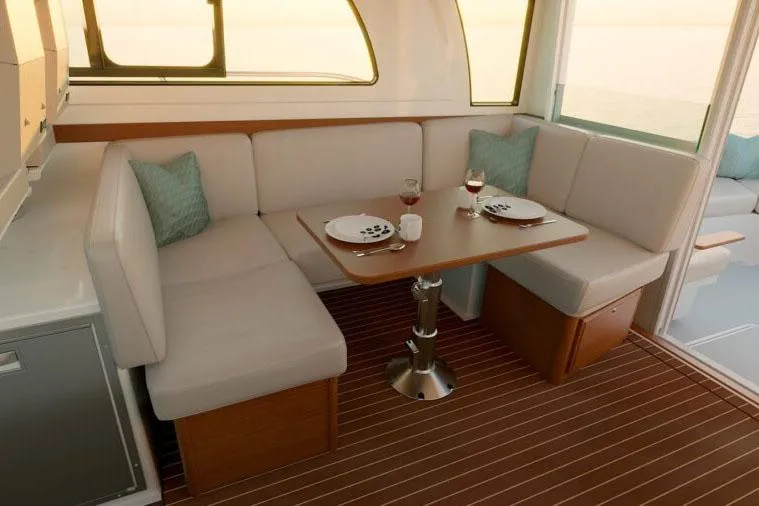 Slide: The Image of Luxurious interior of 2026 Back Cove 412 yacht with elegant dining and kitchen area. - 6