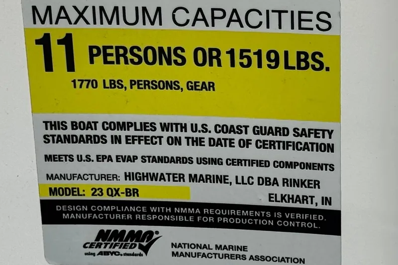 Slide: The Image of 2018 Rinker 23QX BR capacity label, 11 persons or 1519 lbs, NMMA certified. - 27