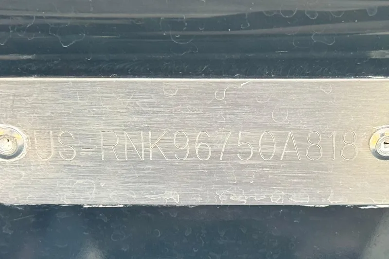 Slide: The Image of 2018 Rinker 23QX BR boat identification plate with serial number. - 28