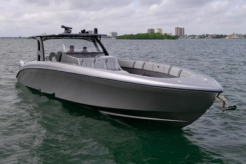 Slide: The Image of Manufacturer Provided Image: 2019 Midnight Express 43 Open boat on water, sleek design, luxury performance. - 4