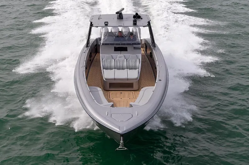 Slide: The Image of Manufacturer Provided Image: 2019 Midnight Express 43 Open boat cruising on water, front view. - 5