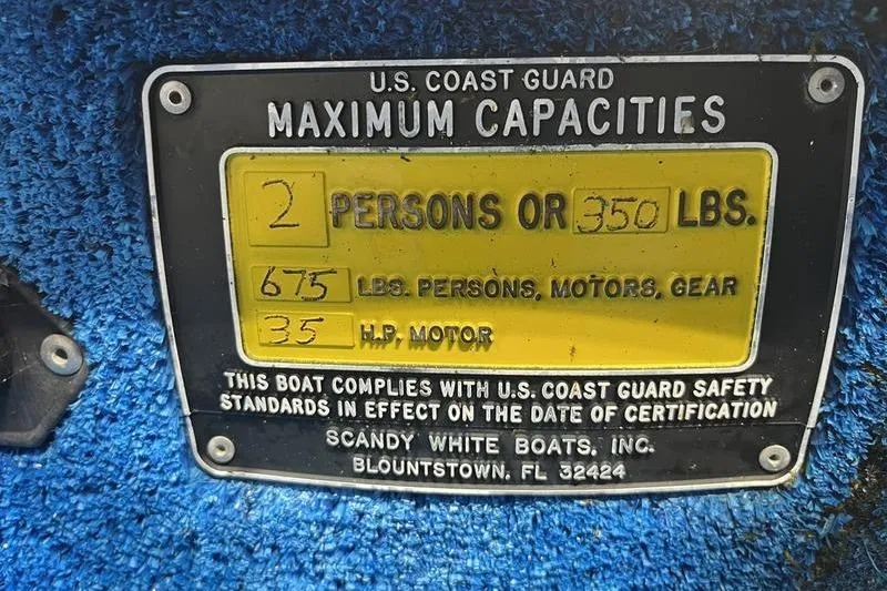 Slide: The Image of U.S. Coast Guard capacity plate for 2006 SCANDY WHITE 1310 boat, 2 persons or 350 lbs. - 10