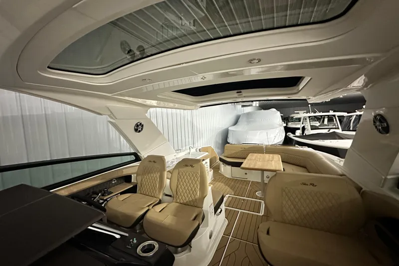 Slide: The Image of 2026 Sea Ray SLX 400 interior with luxurious seating and modern design. - 15