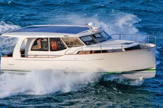 The Image of 2019 Greenline 33 Hybrid yacht cruising on open water, showcasing sleek design and hybrid technology. - 0