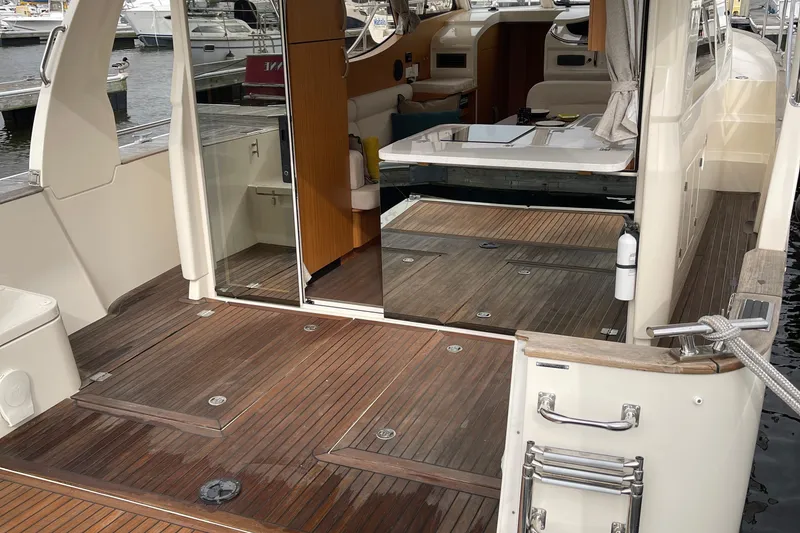 Slide: The Image of 2019 Greenline 33 Hybrid yacht interior with wooden deck and modern design. - 21