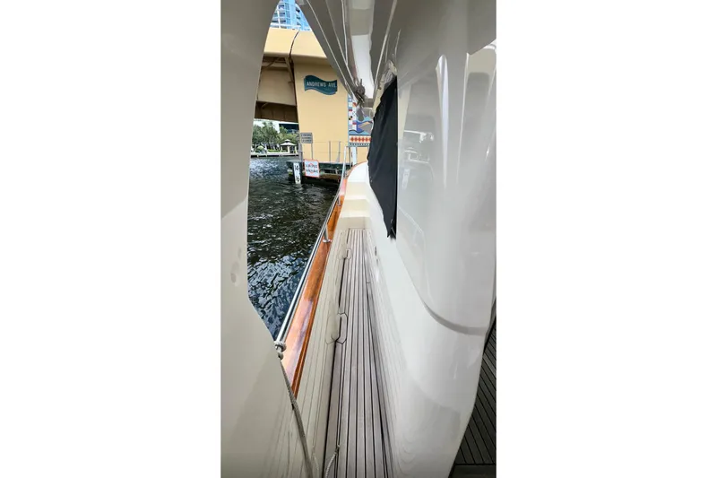 Slide: The Image of 2019 Greenline 33 Hybrid yacht side view near Andrews Avenue bridge. - 32