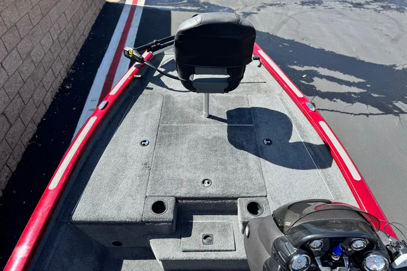 Slide: The Image of 2022 Tracker Pro Team 175 TXW boat, red exterior, gray interior, single seat, steering console. - 11