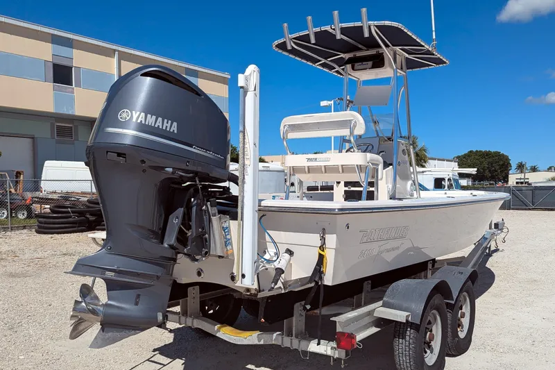 Slide: The Image of 2011 Pathfinder 2400 Tournament Edition boat with Yamaha engine on trailer. - 1