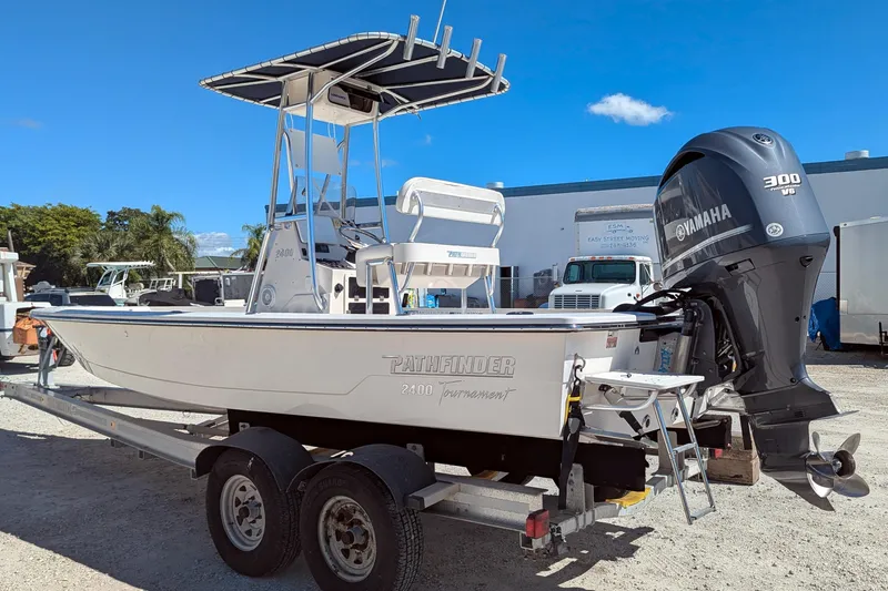 Slide: The Image of 2011 Pathfinder 2400 Tournament Edition boat with Yamaha 300 V6 engine on trailer. - 2