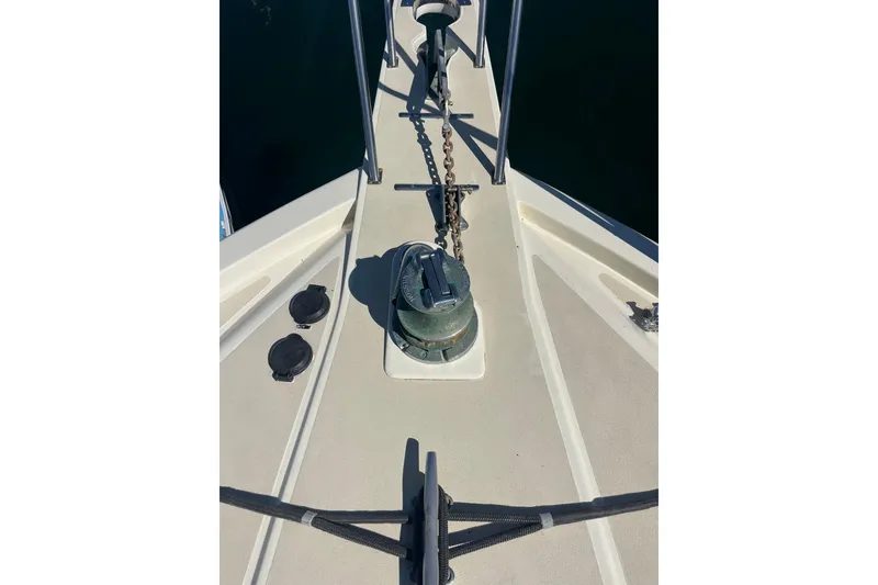 Slide: The Image of Bow of 1987 Californian 44 Veneti yacht with anchor chain and winch. - 19