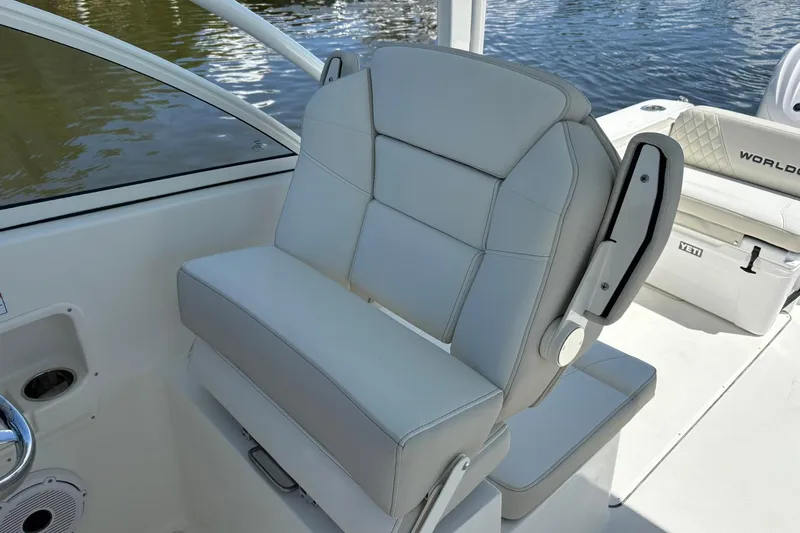 Slide: The Image of Luxurious seating on 2026 World Cat 296 DC boat, featuring sleek design and comfort. - 10