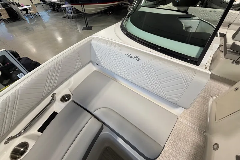 Slide: The Image of Interior of 2026 Sea Ray SDX 230 boat with luxurious seating and modern design. - 20