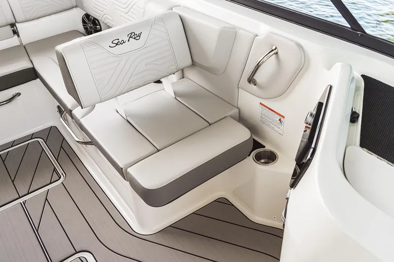 Slide: The Image of 2026 Sea Ray SDX 230 boat interior with white seating and deck details. - 8