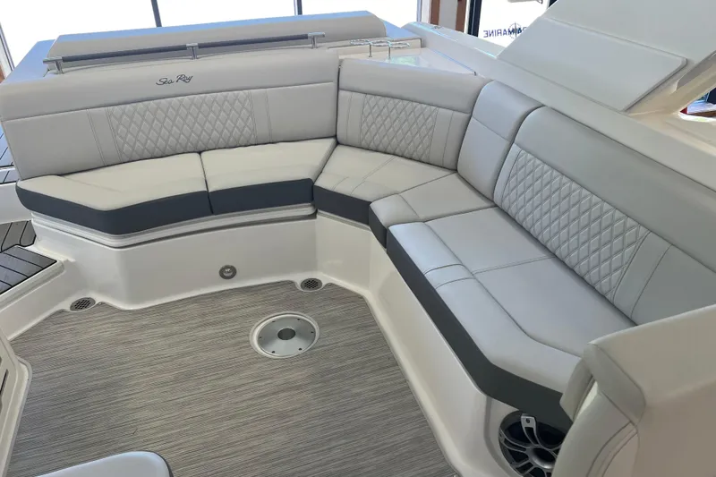 Slide: The Image of Luxurious seating on 2024 Sea Ray SLX 310 boat, featuring elegant upholstery and modern design. - 10