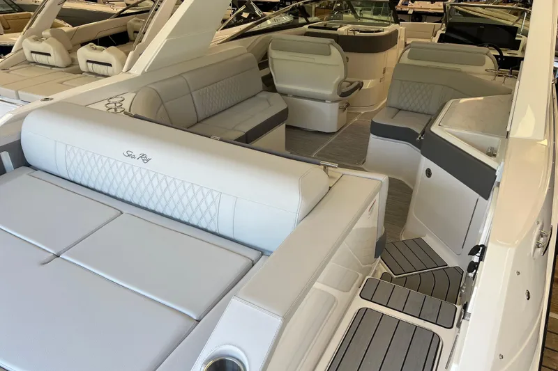 Slide: The Image of Luxurious interior of 2024 Sea Ray SLX 310 boat with elegant seating. - 2