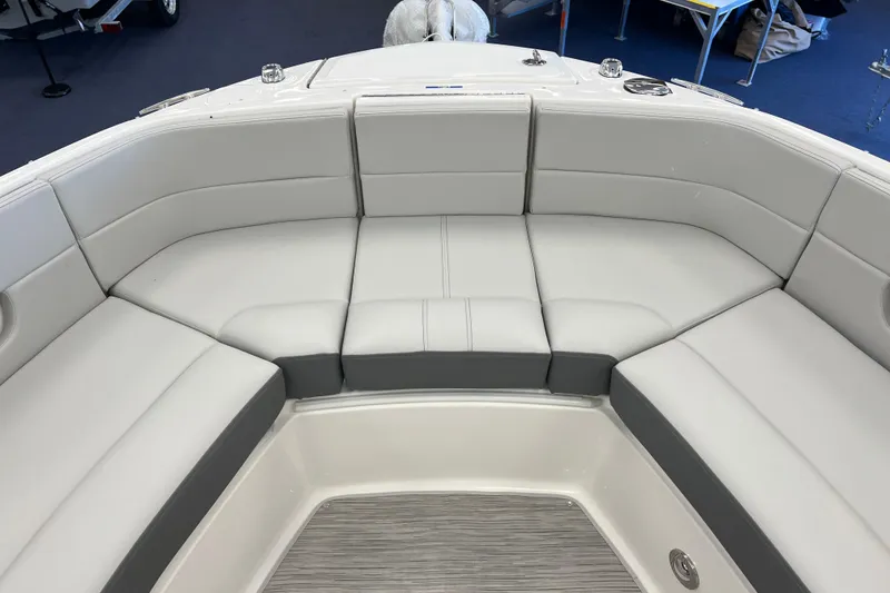 Slide: The Image of 2024 Sea Ray SLX 310 boat interior with luxurious seating arrangement. - 24