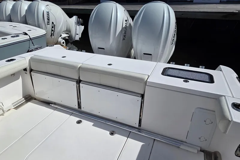 Slide: The Image of 2020 Everglades 335 Center Console boat with Yamaha engines and spacious seating area. - 24