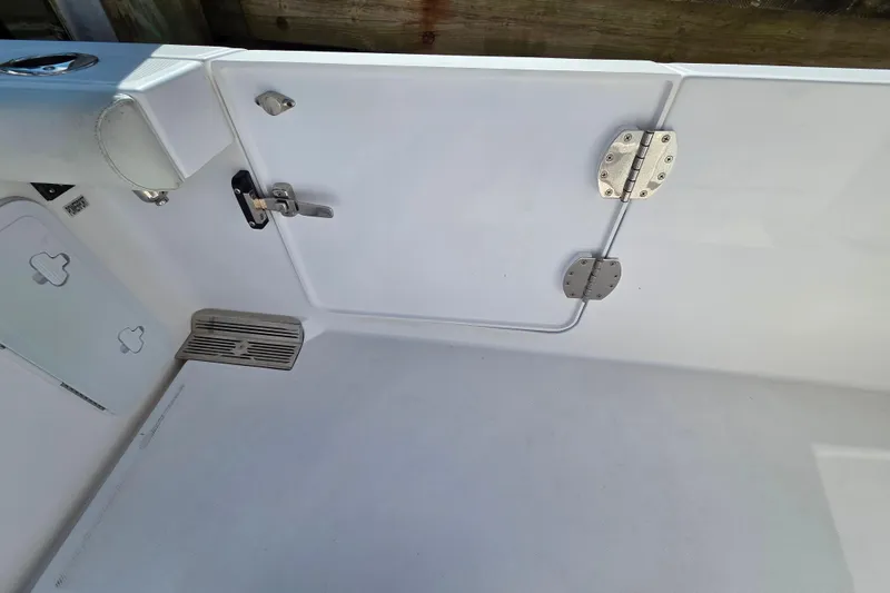 Slide: The Image of 2020 Everglades 335 Center Console boat interior with hatch and stainless steel hinges. - 41