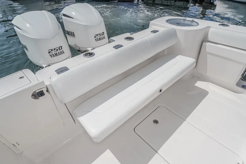 Slide: The Image of 2020 Robalo R272 Center Console boat with Yamaha 250 engines and white seating. - 23