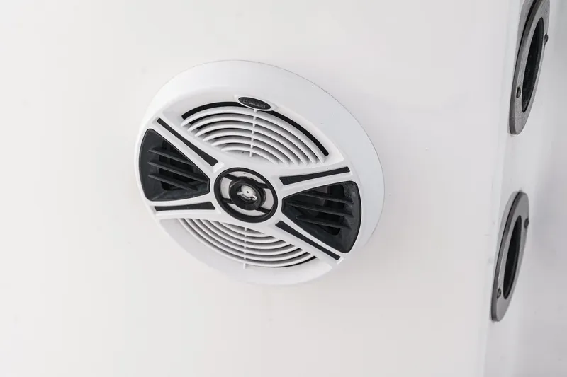 Slide: The Image of 2020 Robalo R272 Center Console boat speaker detail, white and black design. - 40