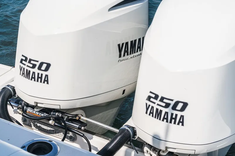 Slide: The Image of Twin Yamaha 250 outboard engines on a 2020 Robalo R272 Center Console boat. - 9