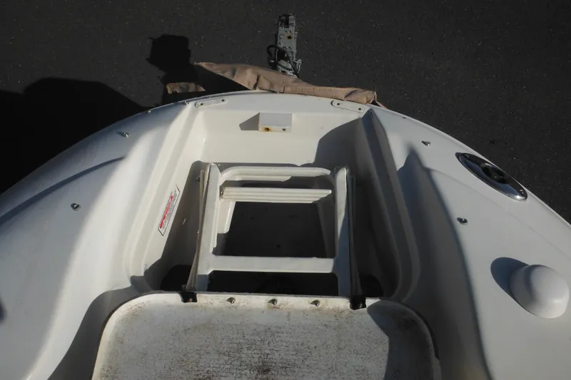Slide: The Image of 2005 Sea Ray 220 Sundeck boat bow with ladder and anchor mount. - 34