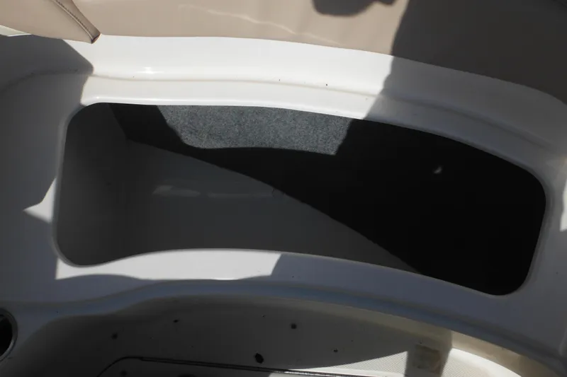 Slide: The Image of Storage compartment on a 2005 Sea Ray 220 Sundeck boat. - 47