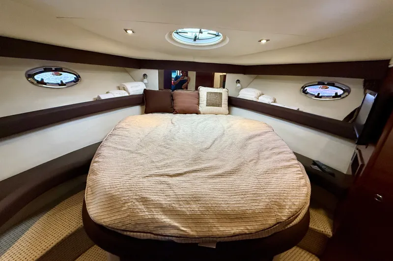 Slide: The Image of Luxurious cabin interior of 2011 Meridian 341 Sedan yacht with cozy bedding. - 15