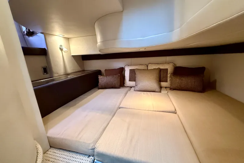 Slide: The Image of Luxurious interior cabin of 2011 Meridian 341 Sedan yacht with cozy bedding. - 17