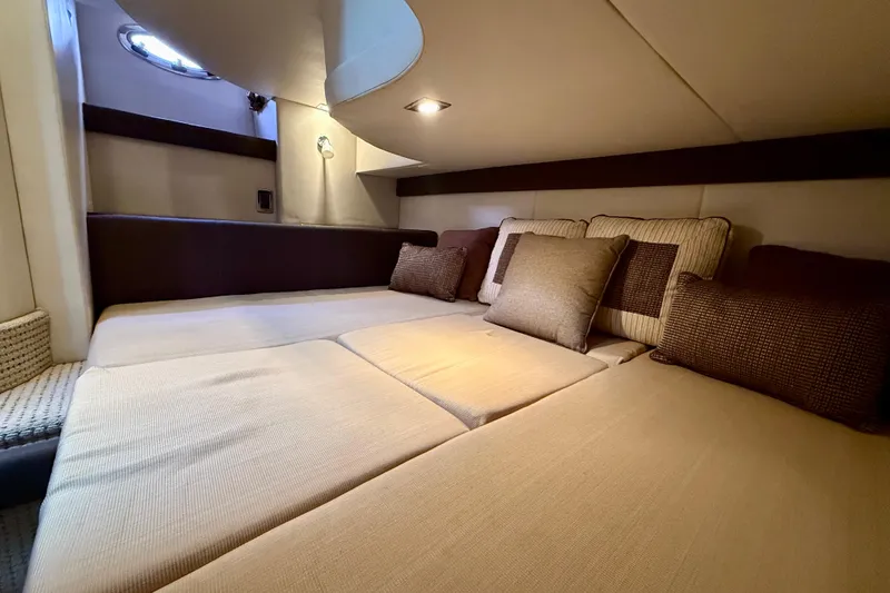Slide: The Image of Luxurious interior cabin of 2011 Meridian 341 Sedan yacht with plush cushions. - 18