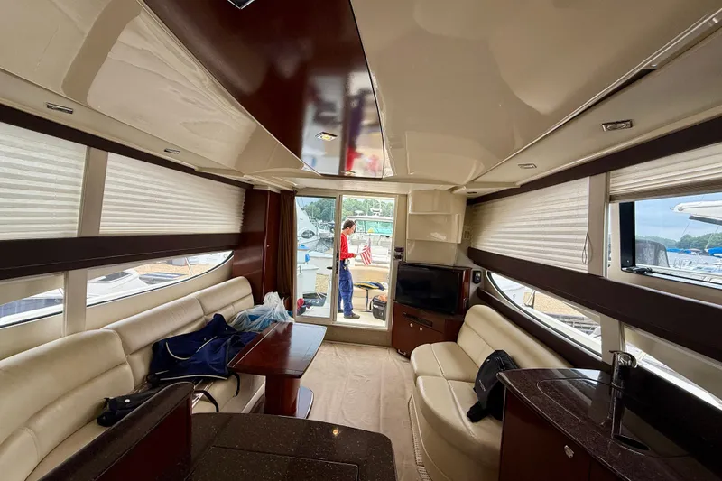 Slide: The Image of Luxurious interior of 2011 Meridian 341 Sedan yacht with leather seating and modern amenities. - 24