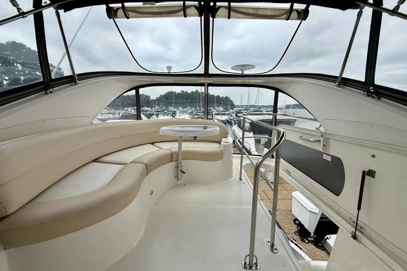 Slide: The Image of 2011 Meridian 341 Sedan interior with beige seating and marina view. - 33