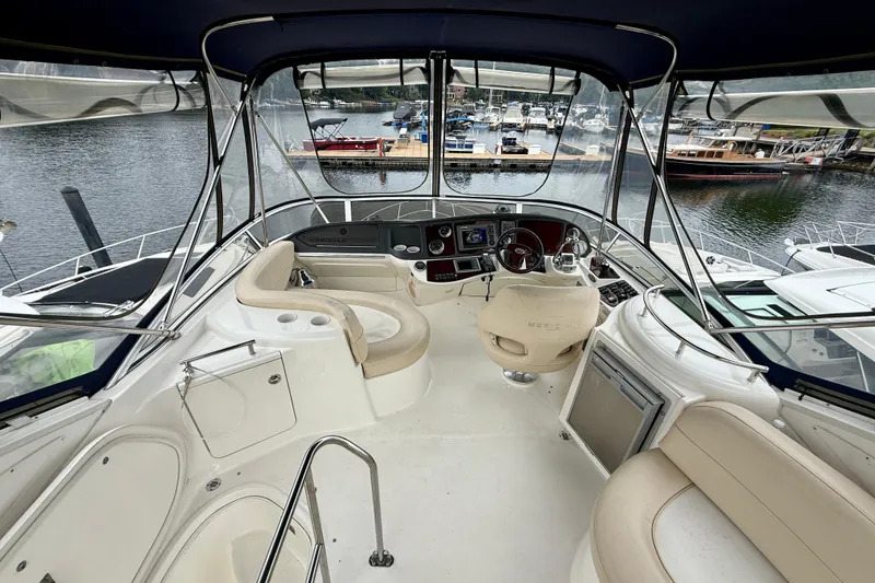 Slide: The Image of Interior view of 2011 Meridian 341 Sedan yacht with luxurious seating and helm. - 9