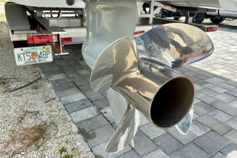 Slide: The Image of Close-up of a 2024 World Cat 325 CC boat propeller on a trailer. - 16